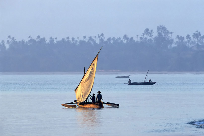 Fishermen sailing out to fish at sunrise, Bagamoyo, Tanzania